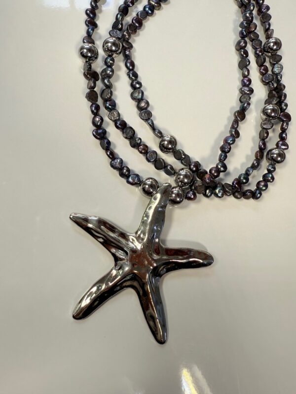 Collar perlas plateadas dije estrella plateada