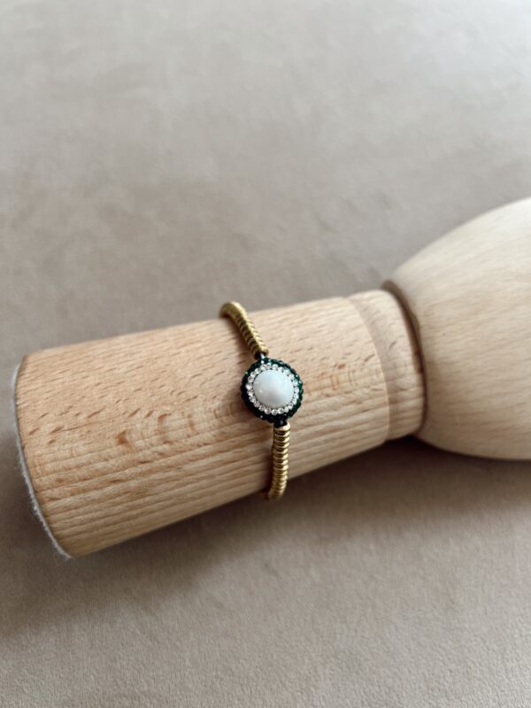 Pulsera dorada perla
