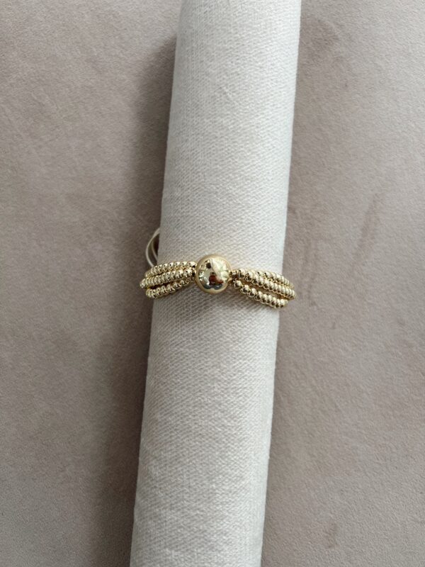 Pulsera balines dorados