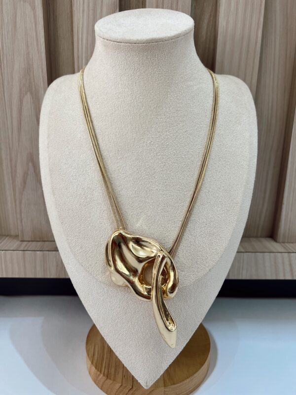Collar abstracto dorado